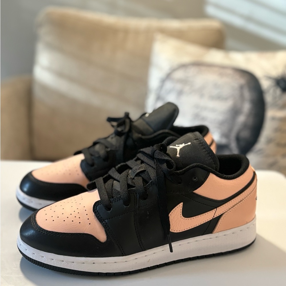 Jordan 1 low crimson tint..
